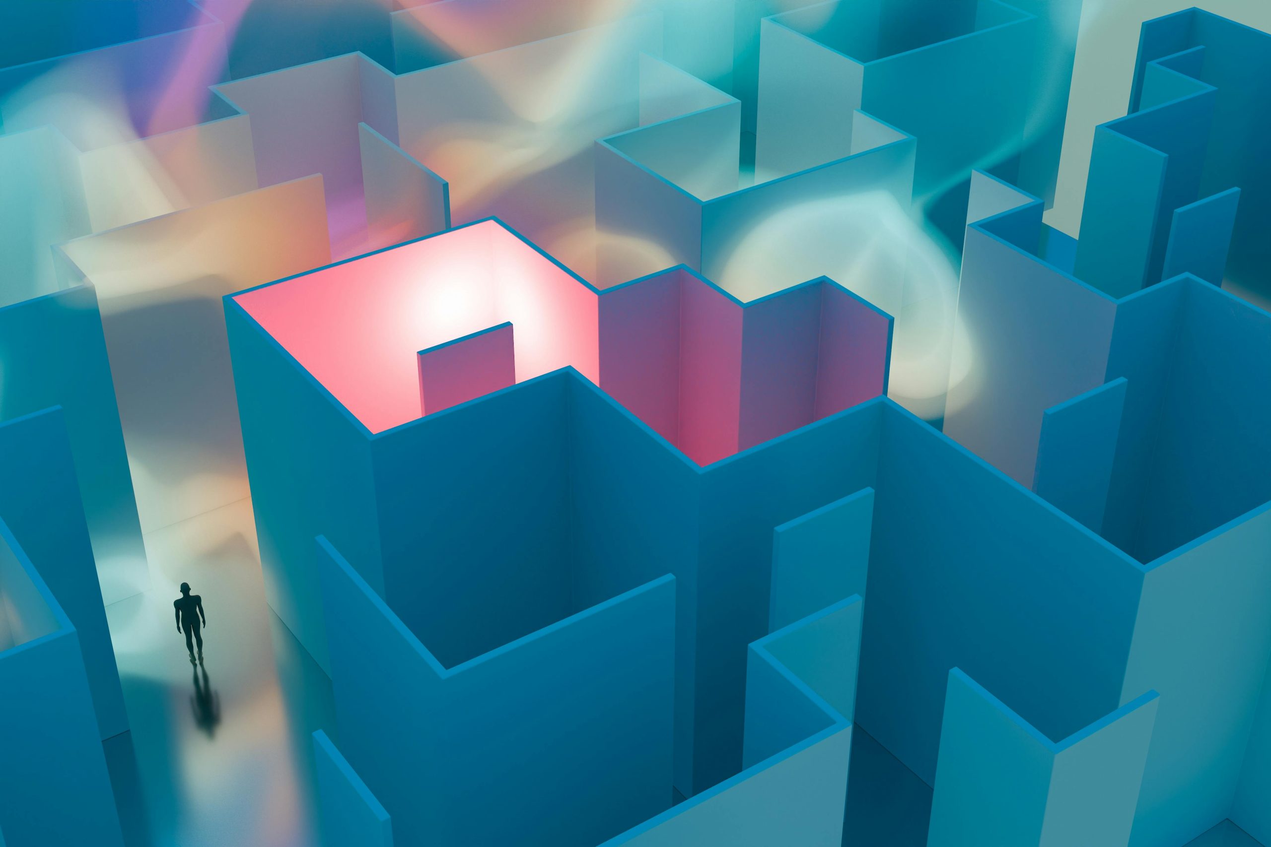 photo of a labyrinth viewed from over head. Maze is made of white walls with different coloured lights shining in various alcoves. A lone black silhouette stands still in the space of a wide corridor